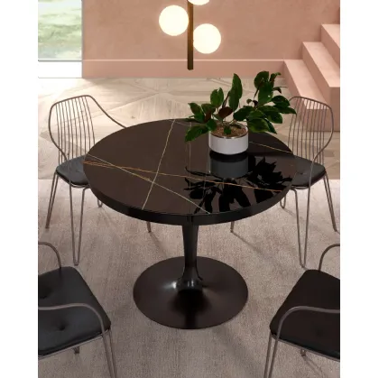 Tavolo rotondo allungabile Eclipse con top in marble glass Sahara Noir Lucido di Ozzio